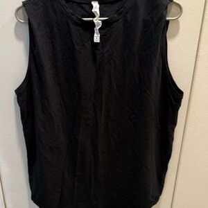 Lululemon Athletica Black Muscle Tank in Cotton. Size 12